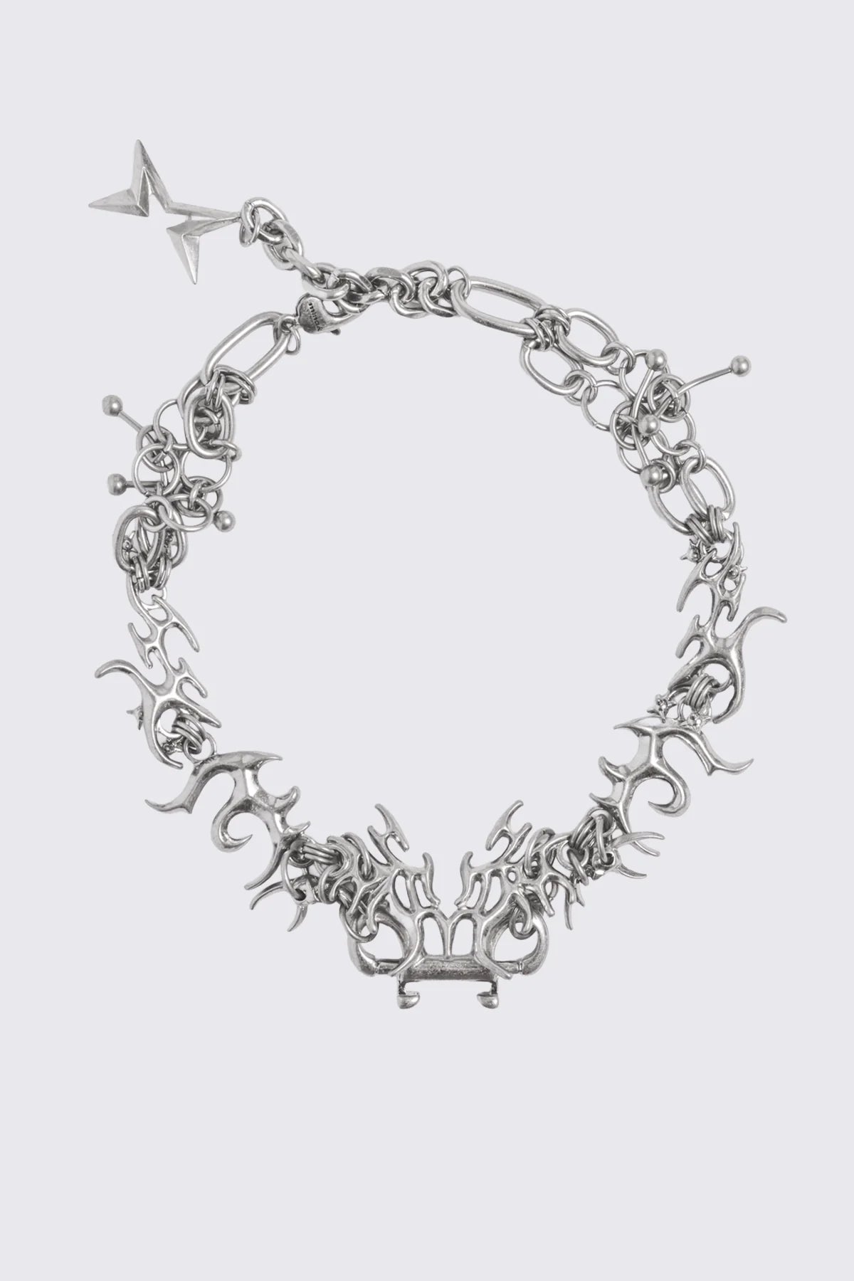 Antique-silver chain necklace with sigil links, adjustable fit and spiked details in a cyber sigilism style.