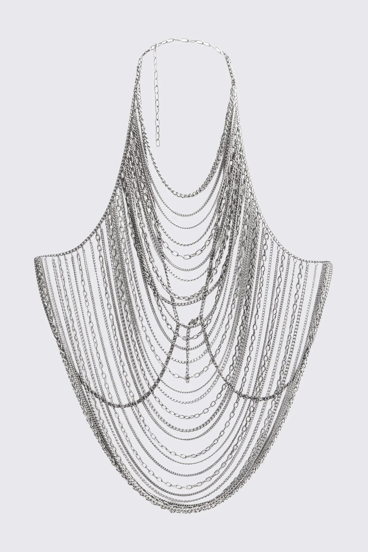 Body chain necklace in antique-silver iron with cascading mixed-link draped layers, goth-inspired statement style.
