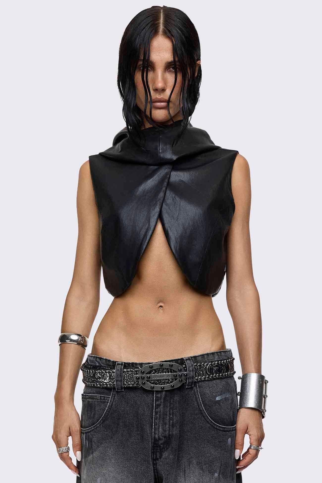 Black hooded vegan leather crop top with a wrap cut-out front, sleeveless shape and cropped length.
