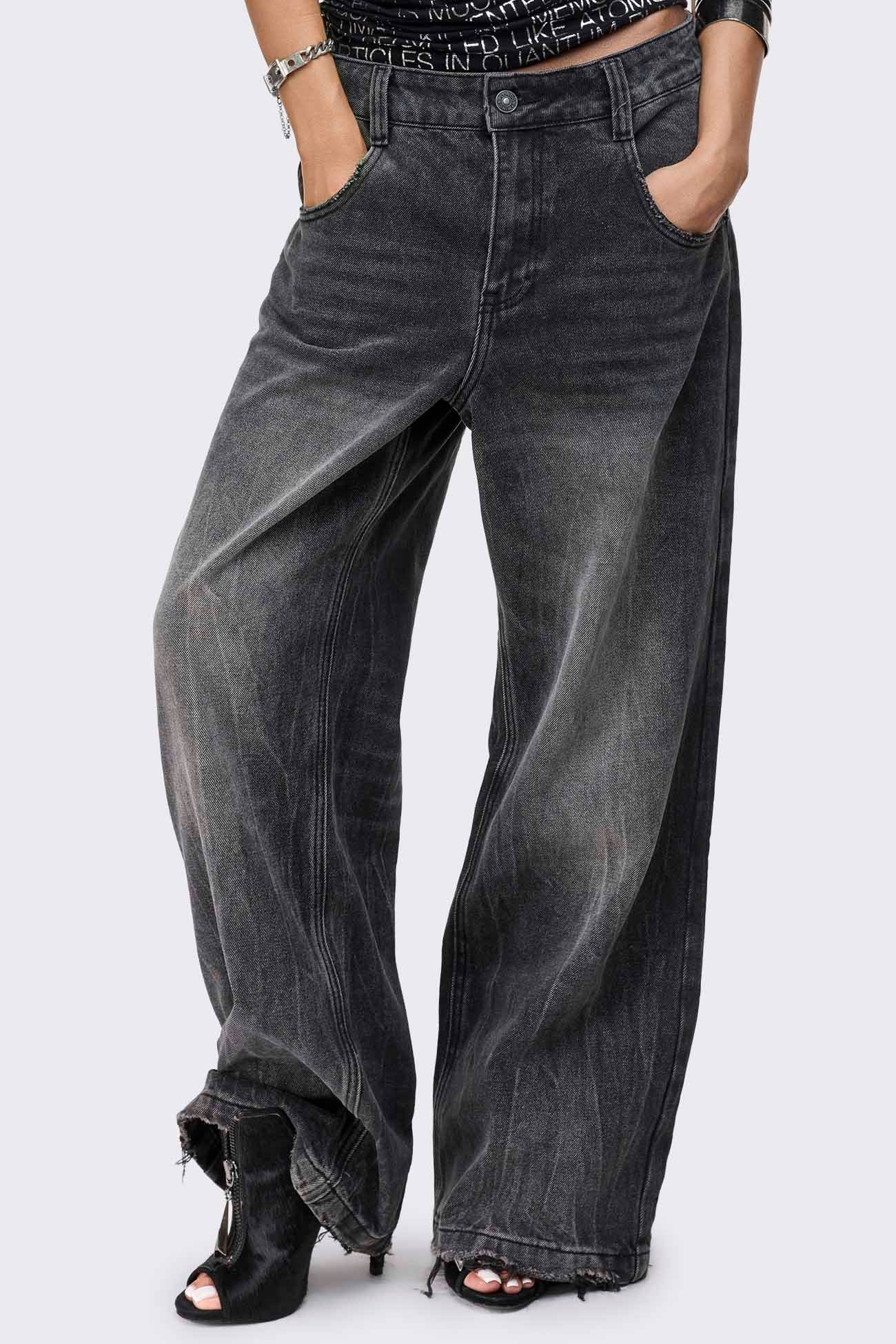 Grey washed baggy jeans with distressed details, raw frayed hem, wide leg fit and embroidered back pocket detail.