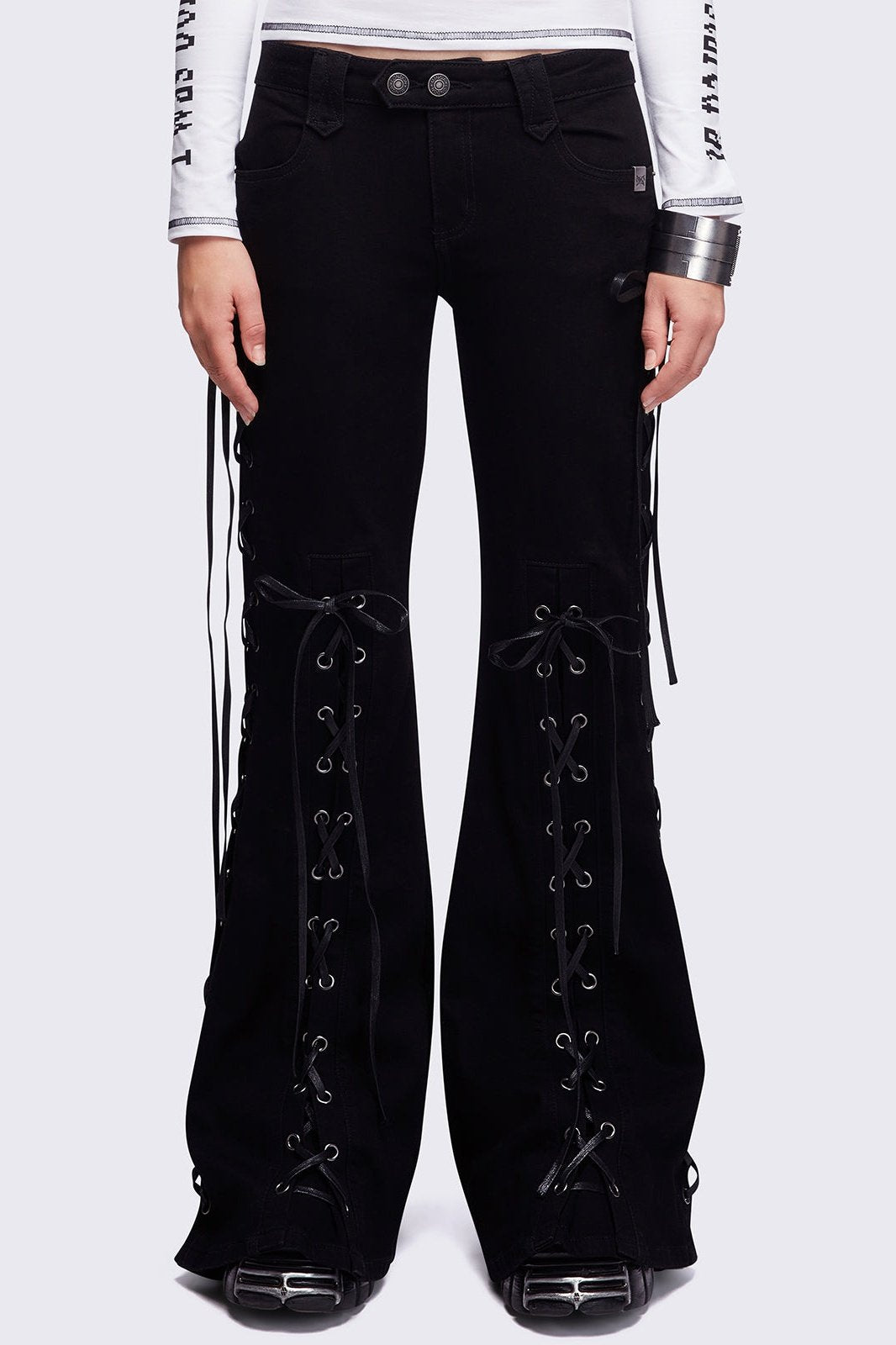 Black lace up flared jeans.