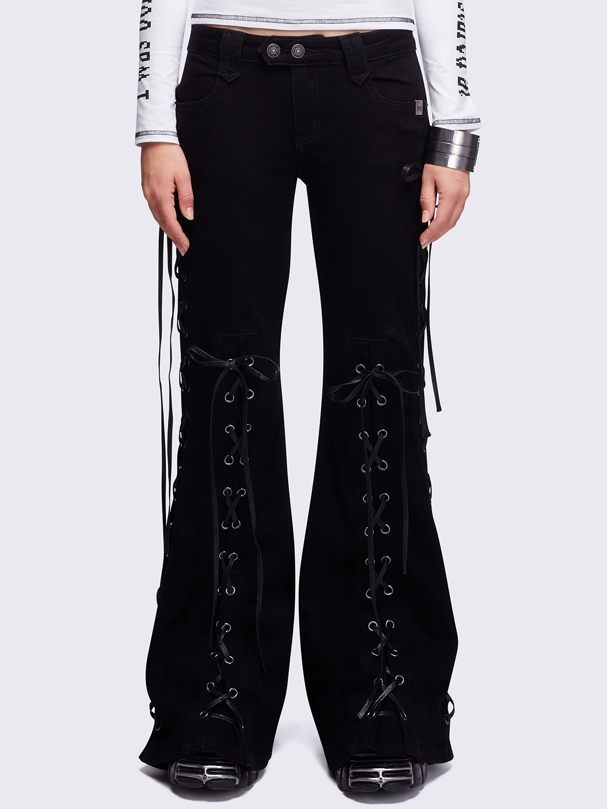 Black lace up flared jeans.