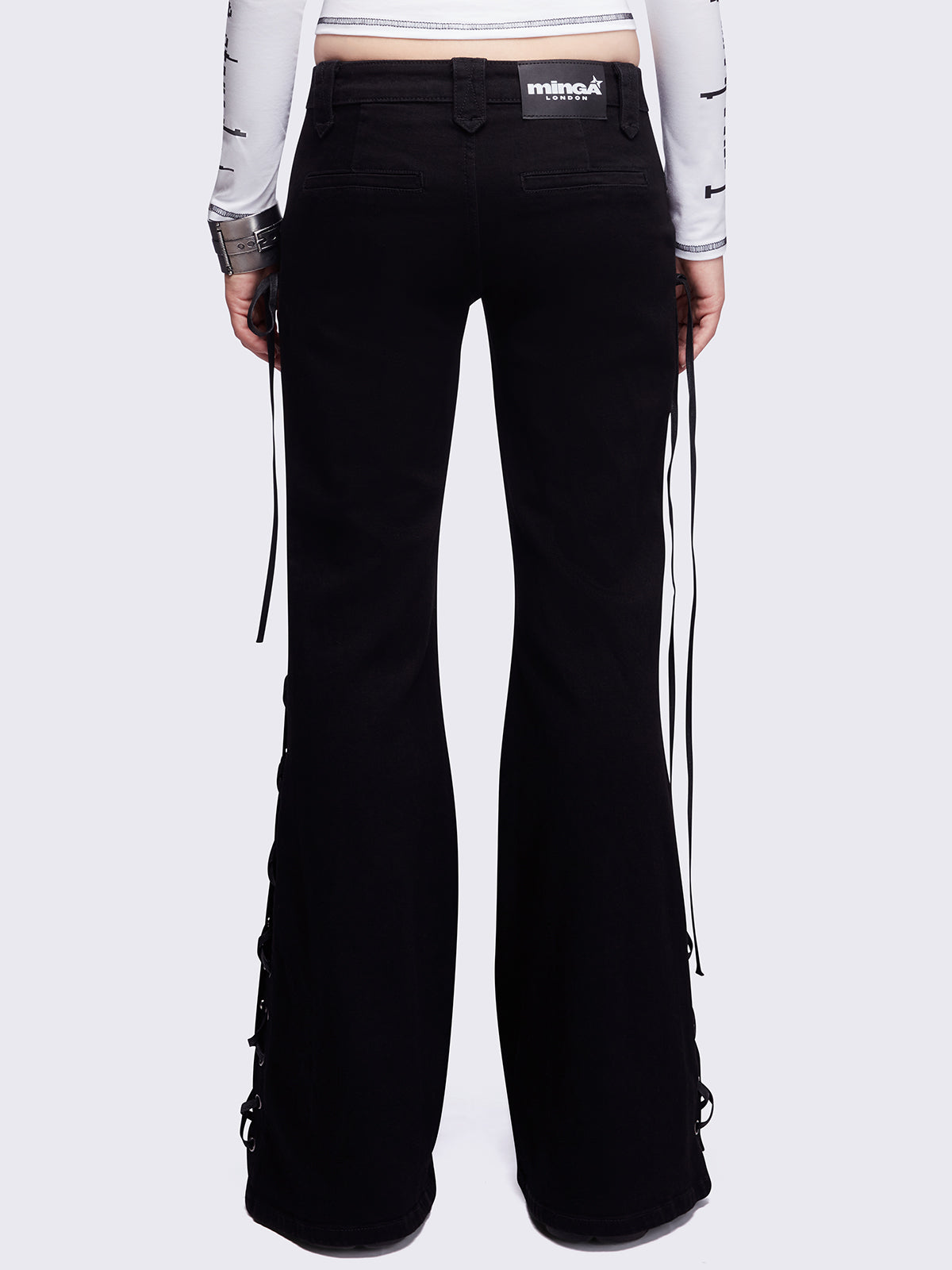 Black lace up flared jeans.