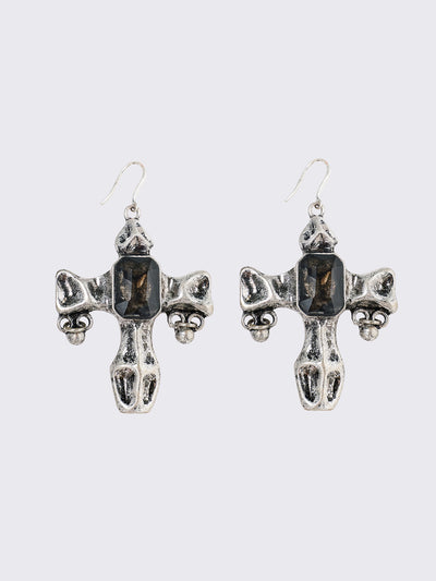 Pair of silver cross-shaped earrings with embedded stones.