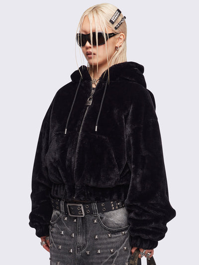 Black oversize faux fur jacket with cat ear hood with piercing details.