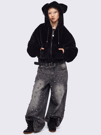 Black oversize faux fur jacket with cat ear hood with piercing details.