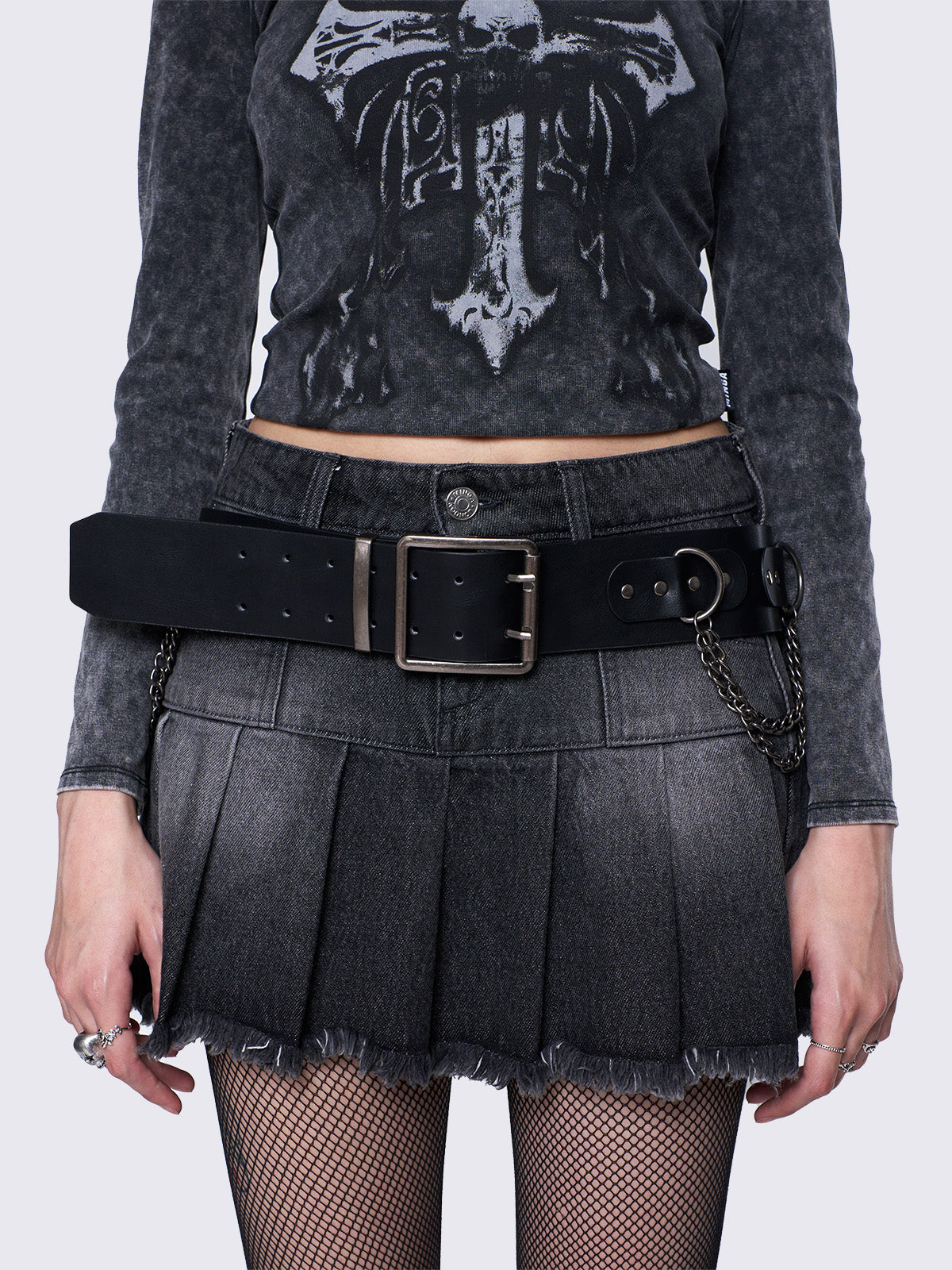 Black vegan leather buckle belt  with stud and chain details. Grunge and goth vibes. 