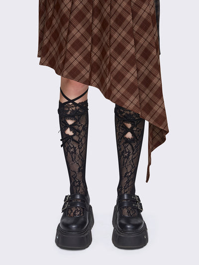 Lace knee high socks in black with cut-outs, ties and bows details