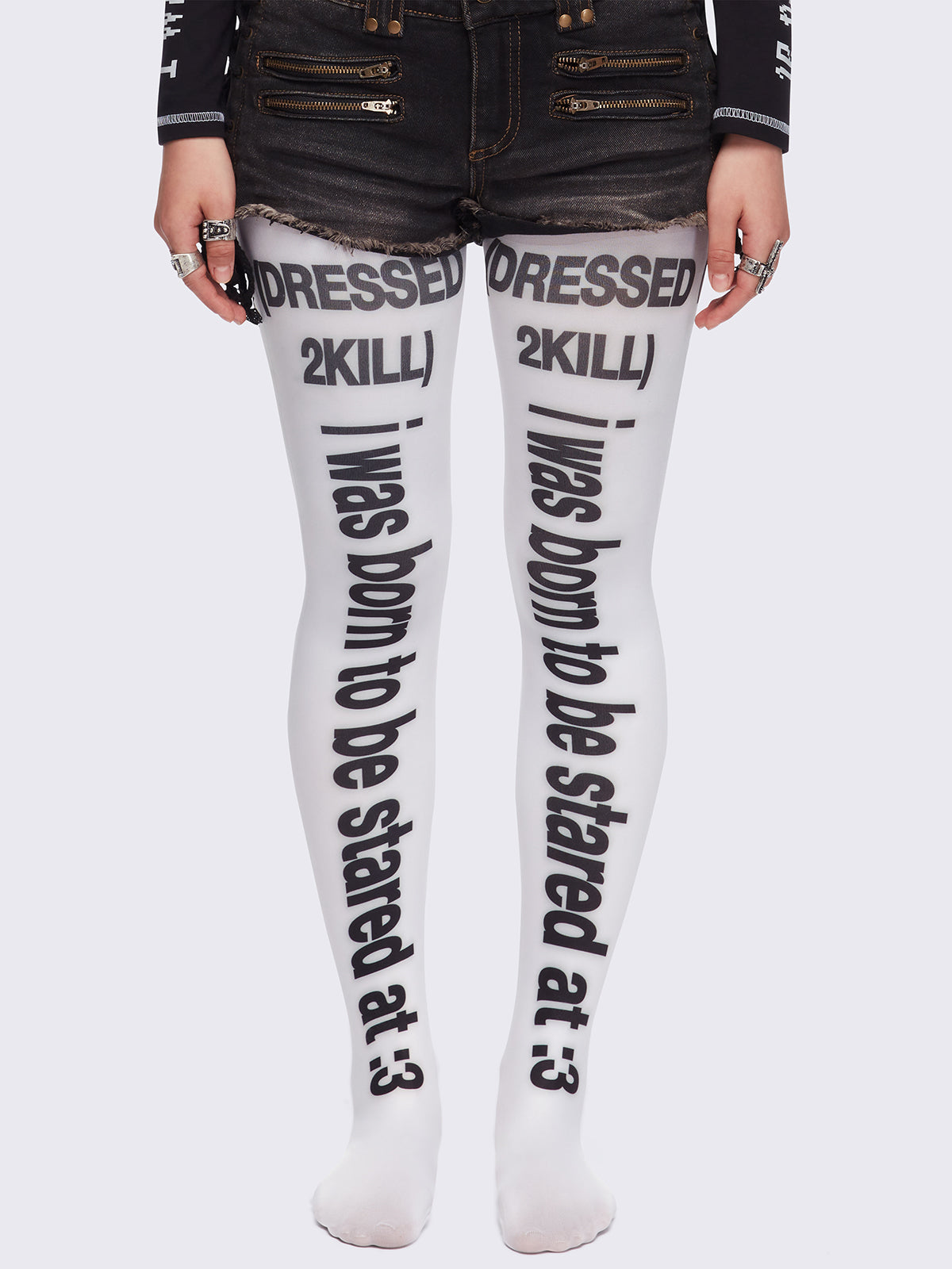 White opaque tights featuring slogan graphic prints.
