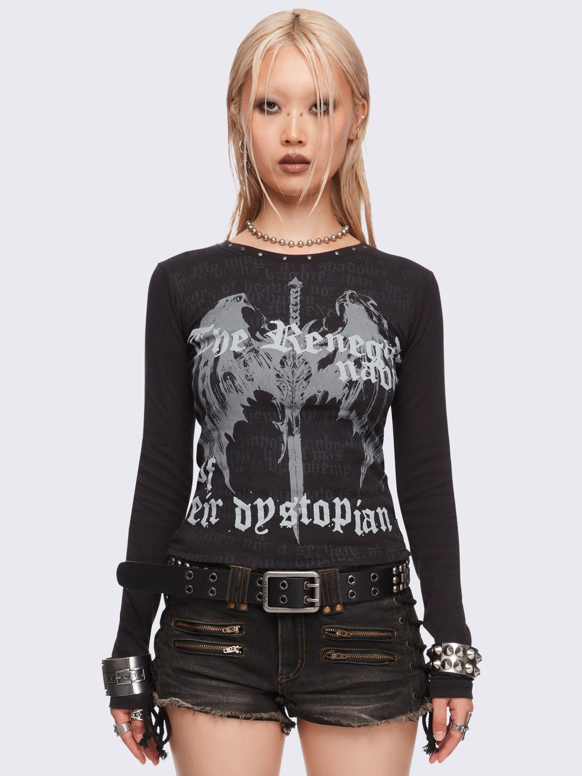 Black long sleeve top featuring a winged dagger and letters graphic print.