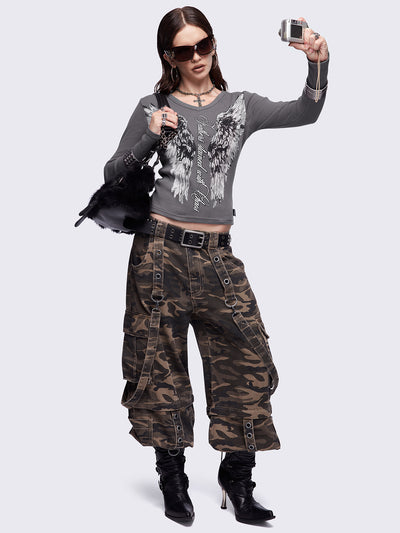 Grey long sleeve top featuring a "Feathers stained with chaos" wings graphic print and v-neck style.