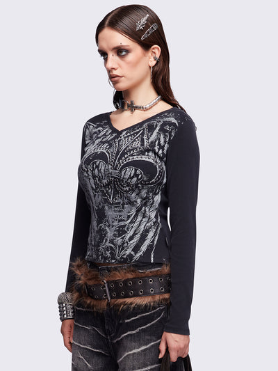 Black washed v-neck ribbed top featuring a fleur-de-lis graphic front print and silver stud details.