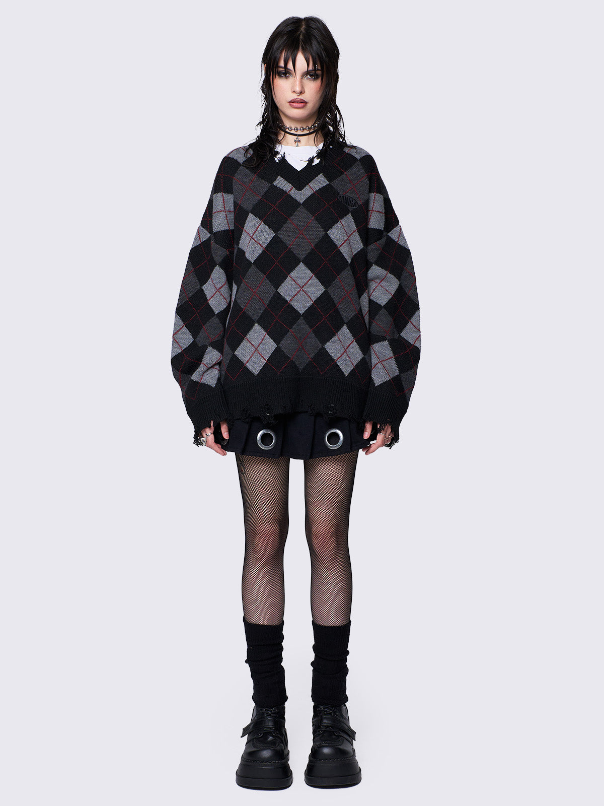 Grey and black argyle knitted jumper with distressed details