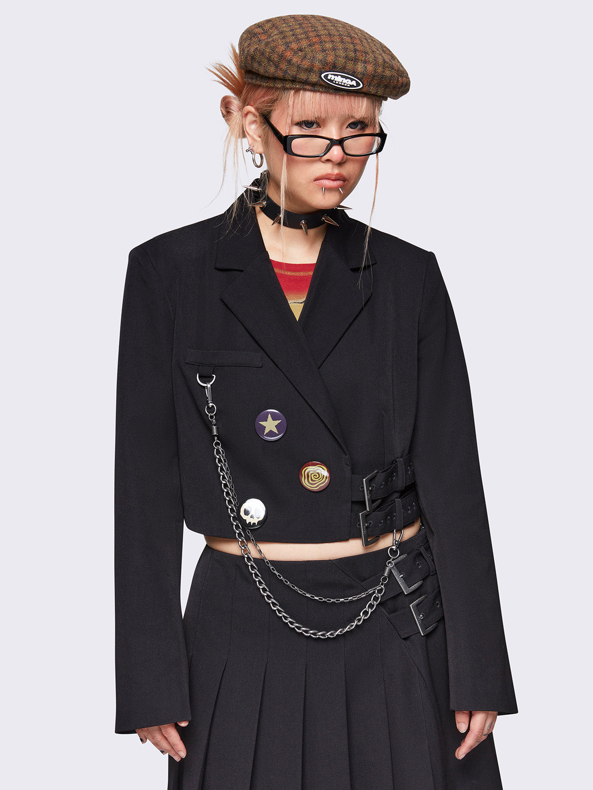 Wrap cropped blazer in black with buckle, chain and pins details.