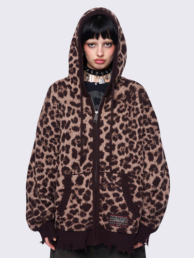 Leopard print knitted zip-up cardigan featuring a hood and distressed ribbed details for a trendy and cozy look