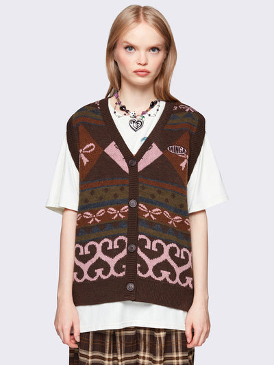 Jacquard knit sweater vest in brown with geometric striped pattern and bows design