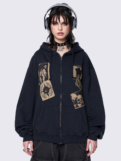 Black oversized zip-up hoodie jacket with beige grunge print patches