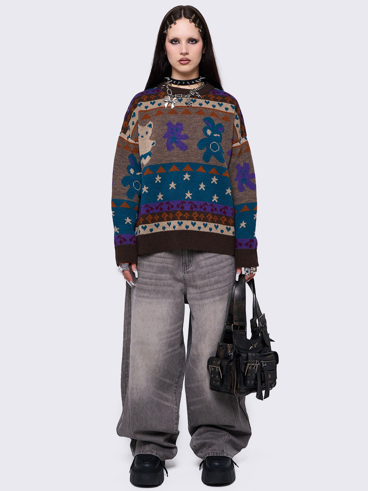 Jacquard knit jumper with playful motifs including teddy bear, stars, cherries and more.