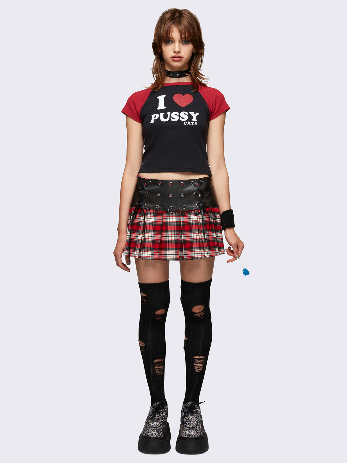 Pleated plaid skirt with leather waist