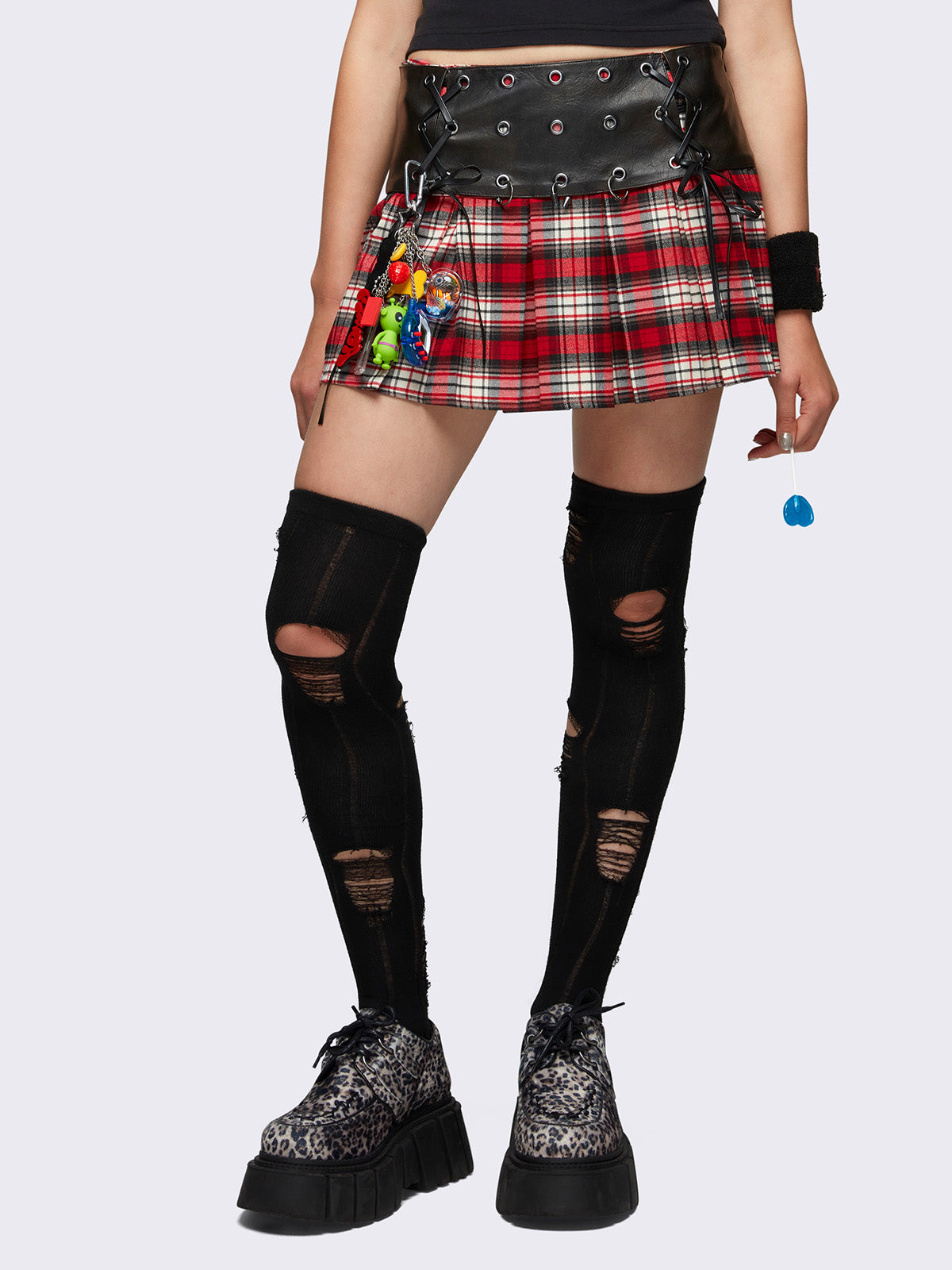 Pleated plaid skirt with leather waist