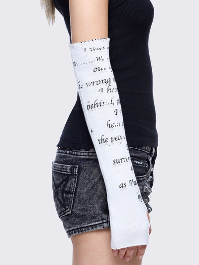 White knitted arm warmers with rosary and text graphic print.