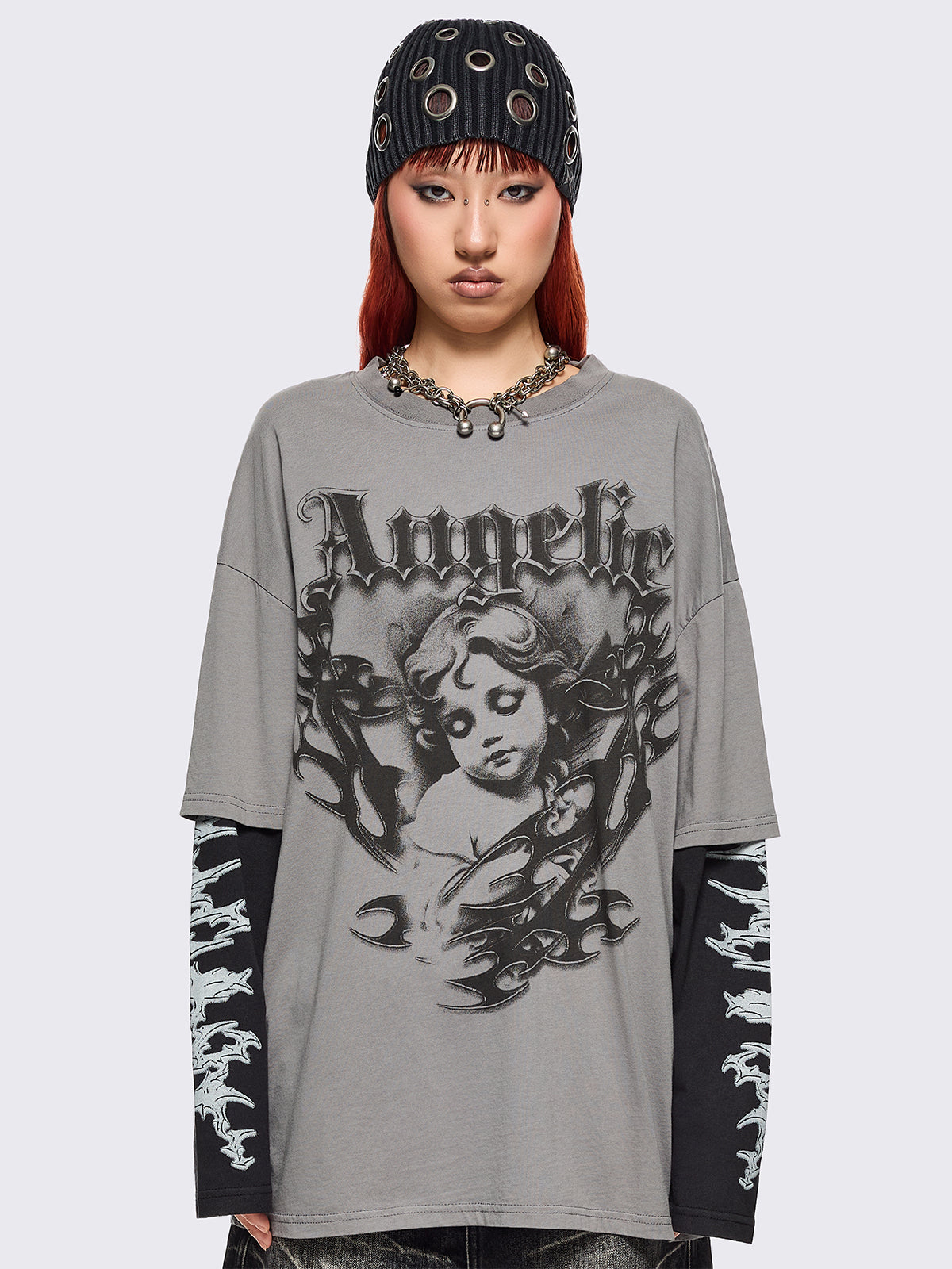 Grey layered long sleeve t-shirt with angelic graphic front print and contrast black sleeves with sigilism print.