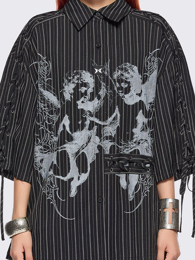 Black pinstriped shirt with white angels graphic front print and laced up details.