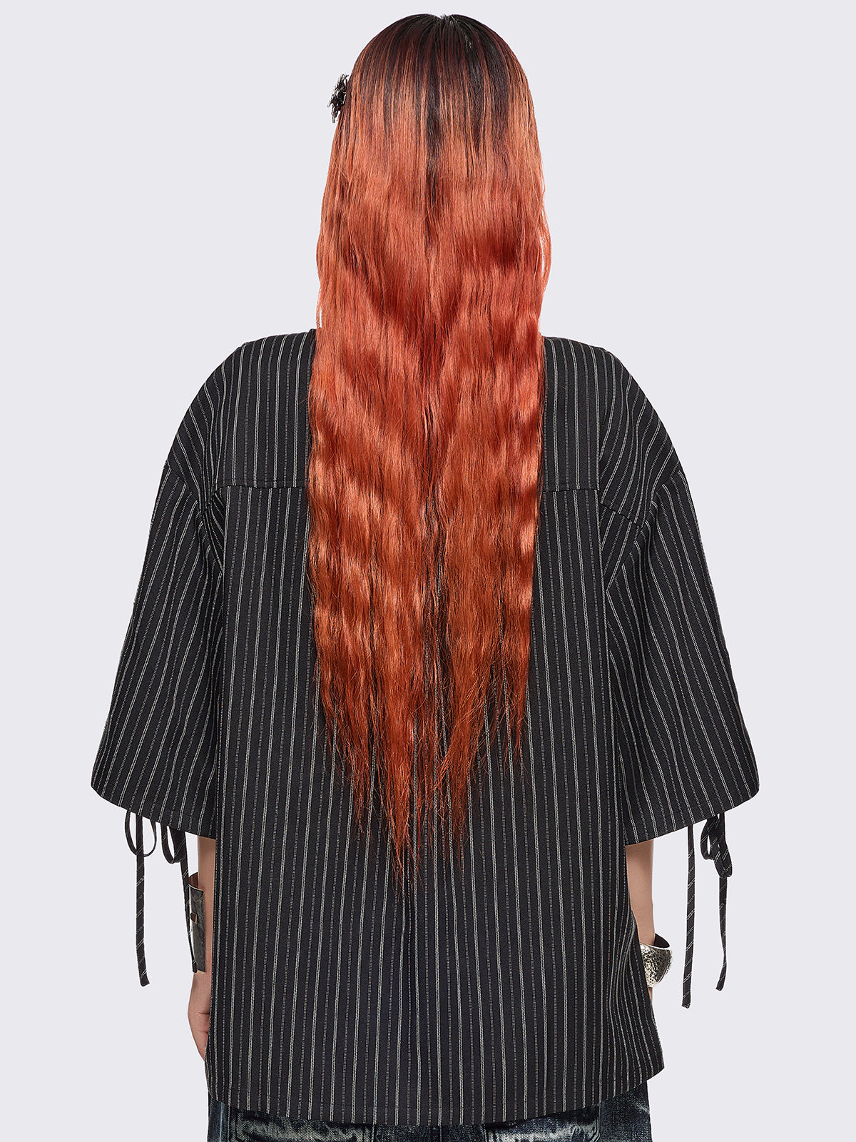 Black pinstriped shirt with white angels graphic front print and laced up details.