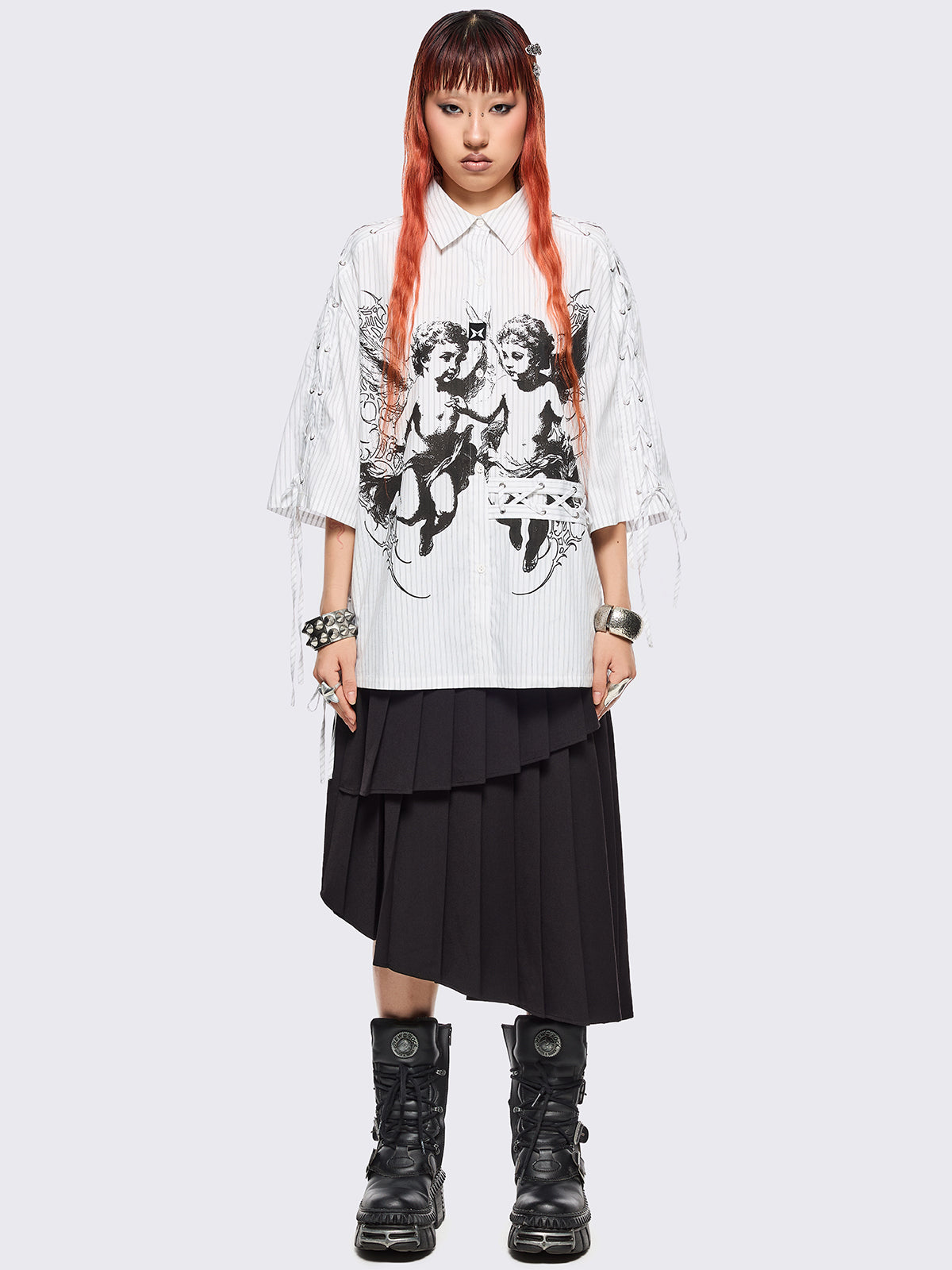 White striped short sleeve shirt featuring a black angels graphic front print and laced up details.