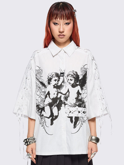 White striped short sleeve shirt featuring a black angels graphic front print and laced up details.