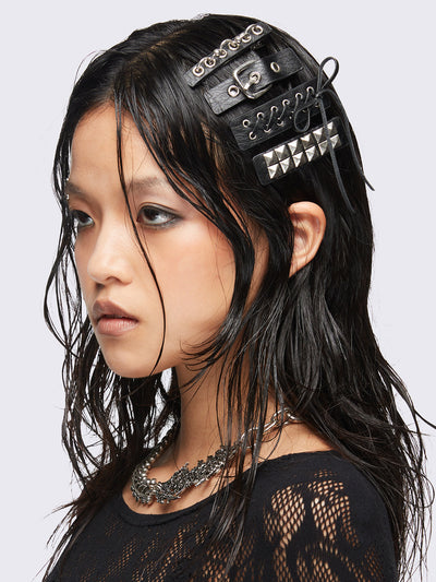 Set of 5 black PU hair clips featuring lace up, buckle, spike, stud and more hardware details. 