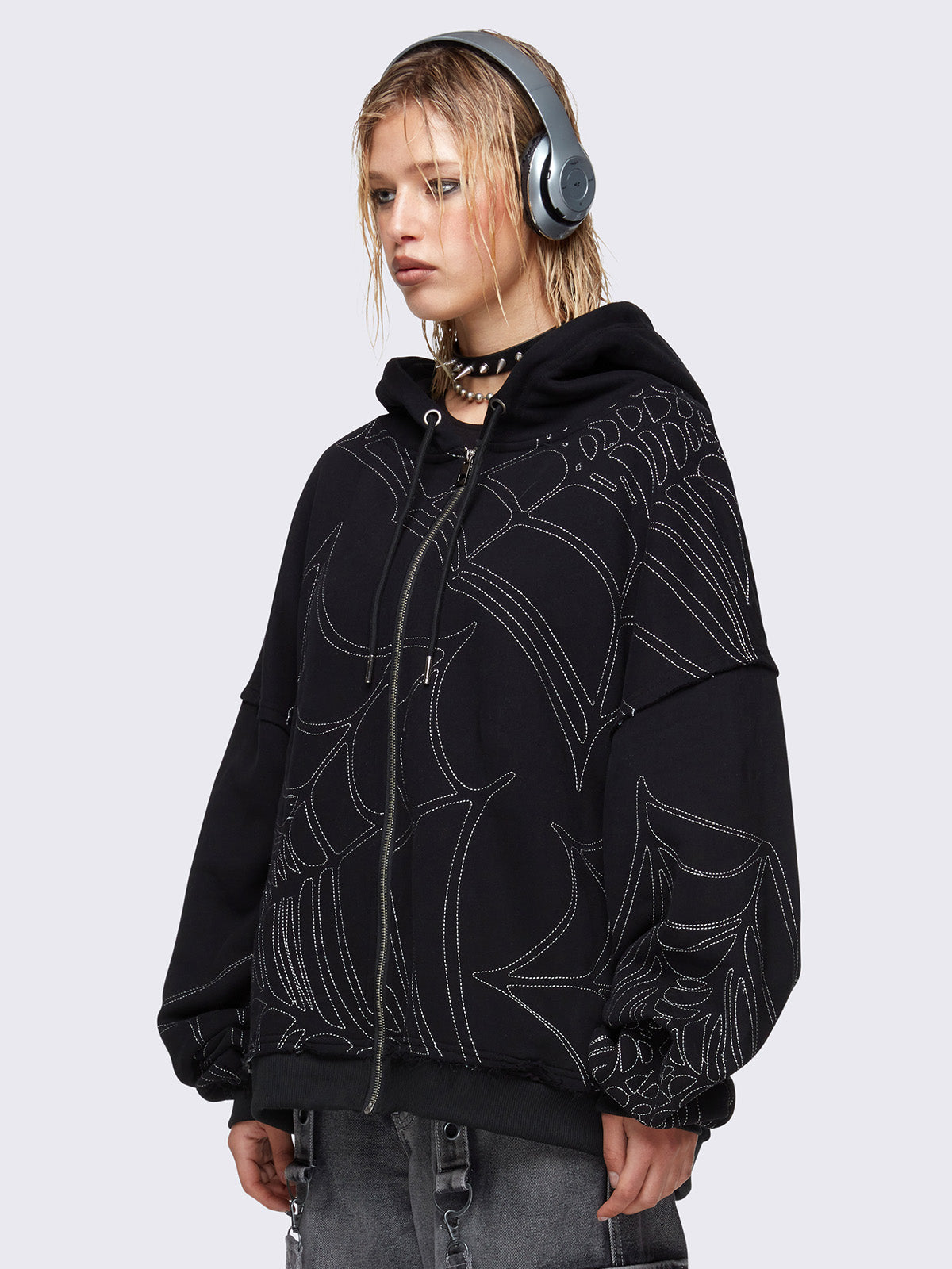 Zip up hoodie jacket in black with spider web graphic embroidery