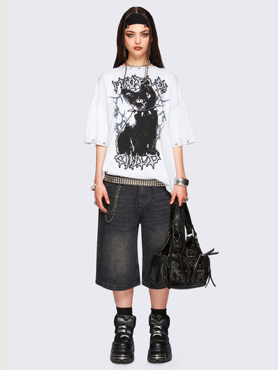 Off-white oversized t-shirt with black kitty graphic front print and eyelet neckline and hem details.