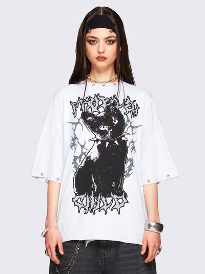 Off-white oversized t-shirt with black kitty graphic front print and eyelet neckline and hem details.