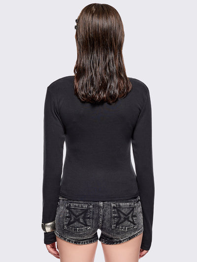 Black long sleeve top with grunge graphic and crosses graphic front print.