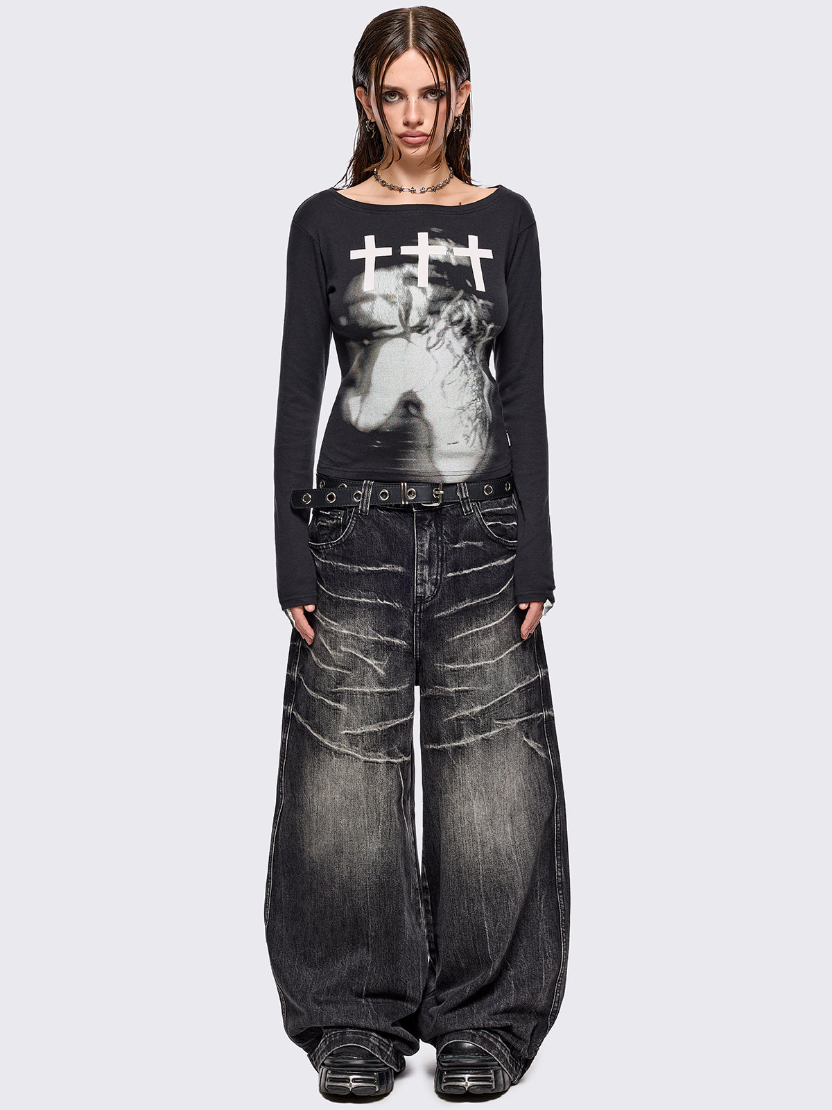 Black long sleeve top with grunge graphic and crosses graphic front print.