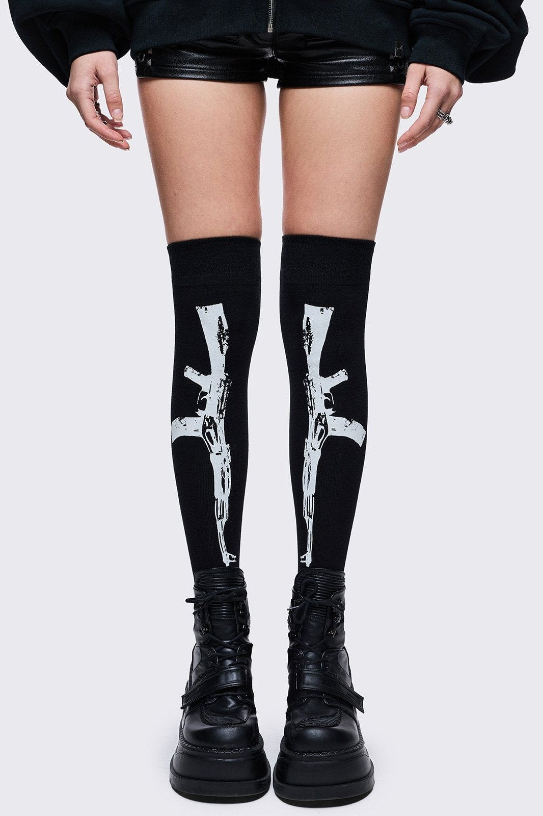 Black opaque thigh highs socks with white graphic design 