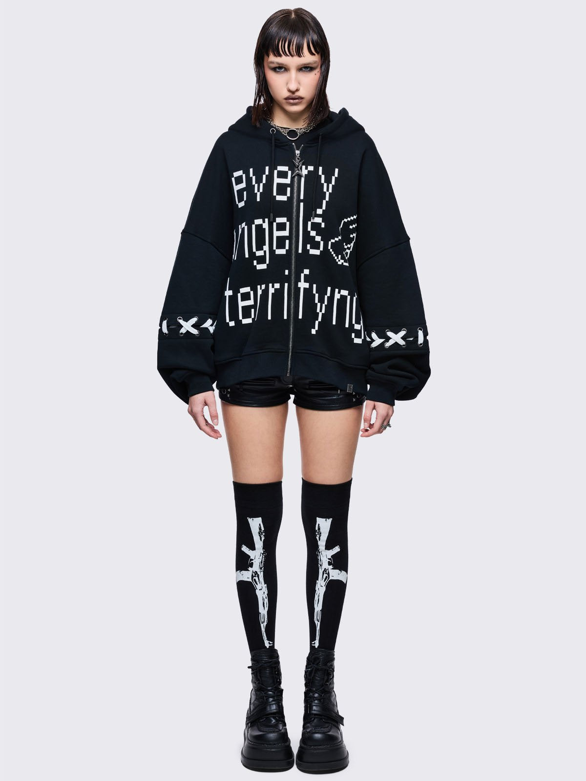 Black opaque thigh highs socks with white gun graphic design 