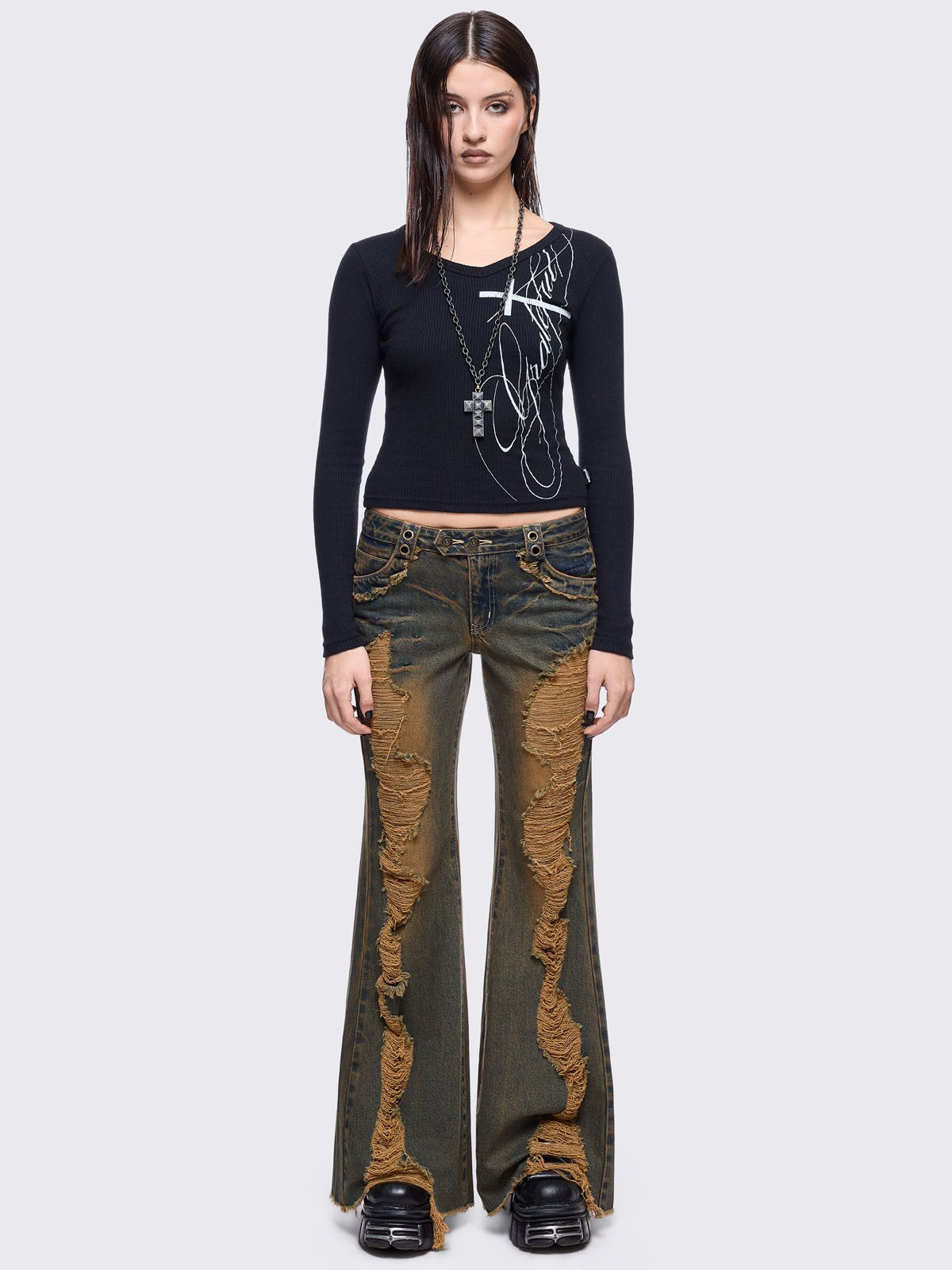 Blue washed flare jeans with honey overdye and front shedded