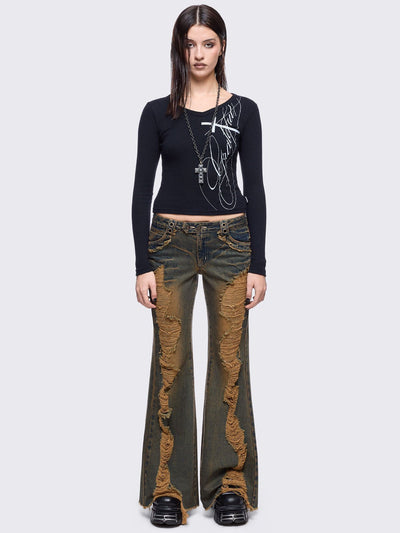 Blue washed flare jeans with honey overdye and front shedded