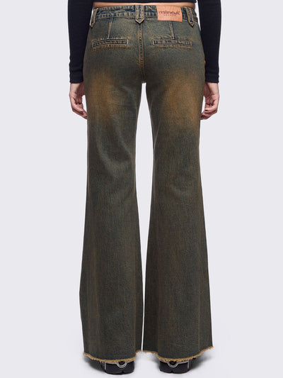 Blue washed flare jeans with honey overdye and front shedded