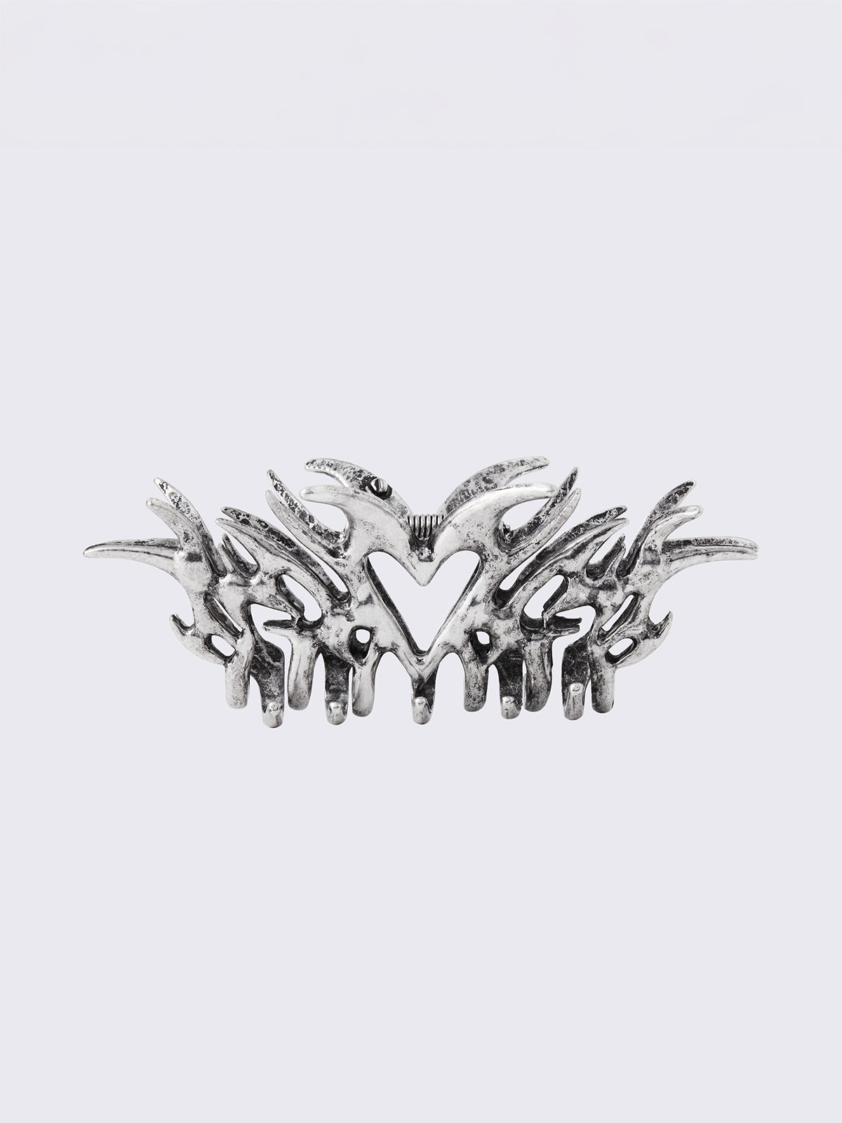 Metal hair claw clip with cyber sigilism heart tattoo design featuring oxidized silver finish.