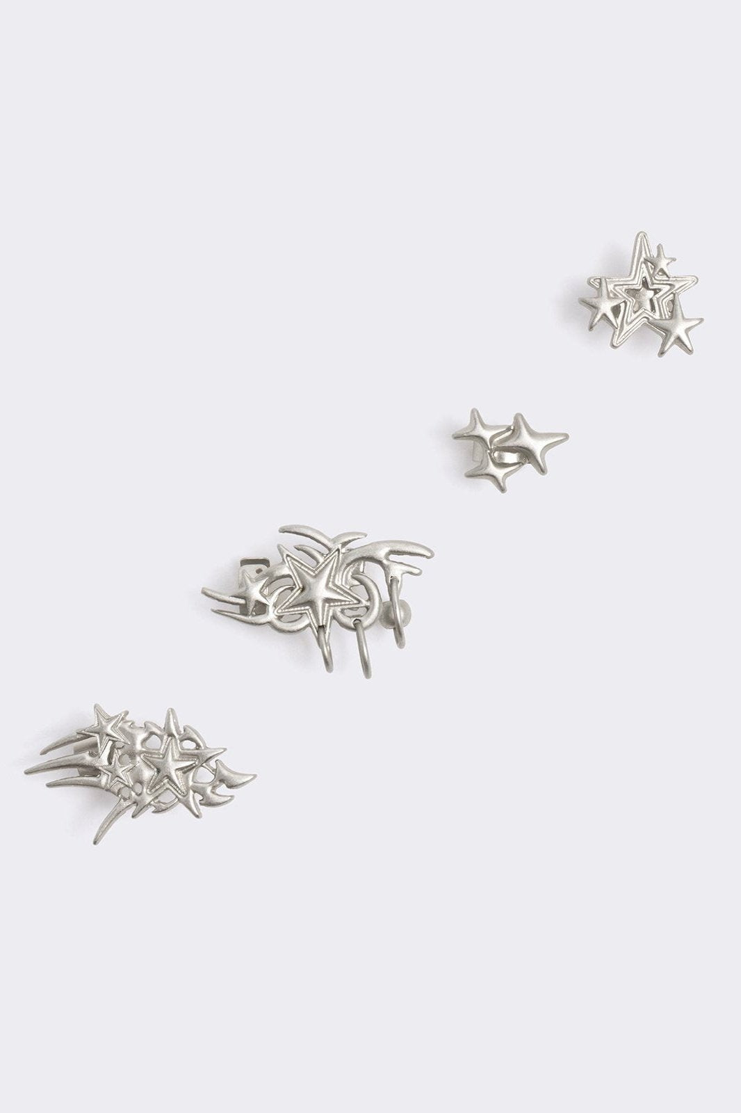 Silver chunky earring set with ear cuffs. All stars design. 