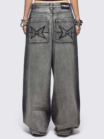 Grey washed baggy jeans with centipede graphic front print. 