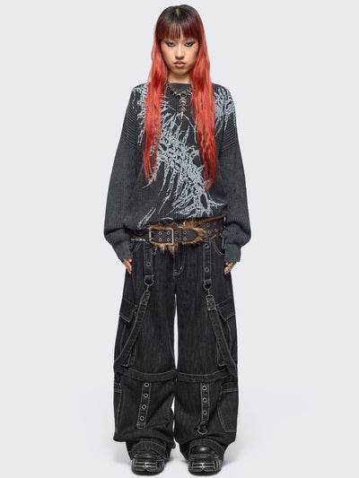 Black washed knit jumper in chunky ribbed knit with centipede graphic front print and distressed hem details. 