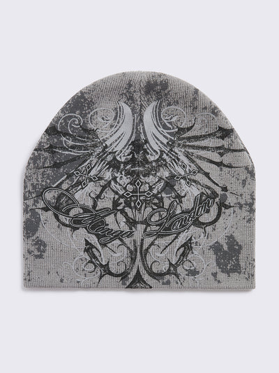 Grey beanie hat with grunge graphic print.