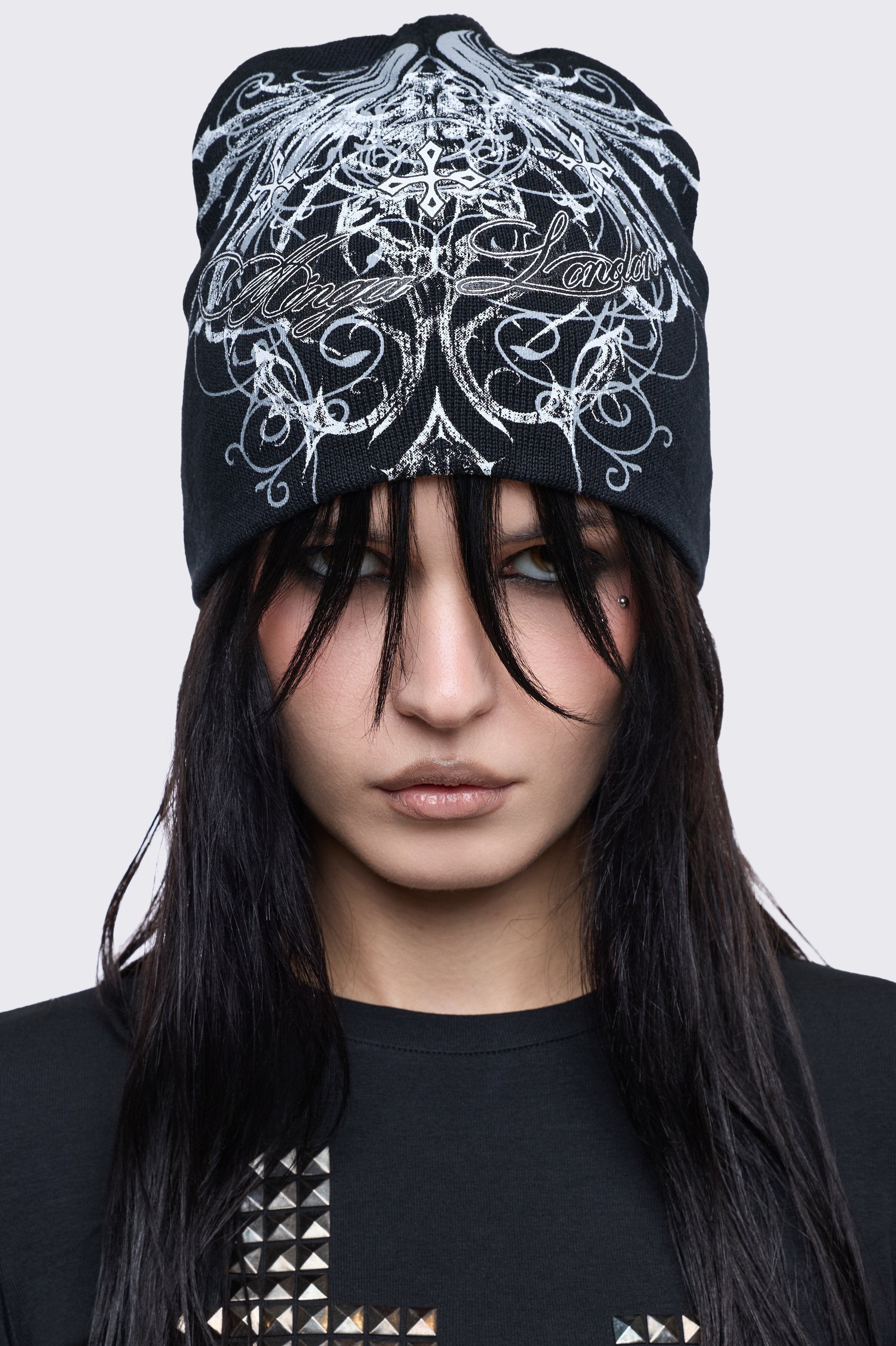 Black beanie hat with grunge graphic print