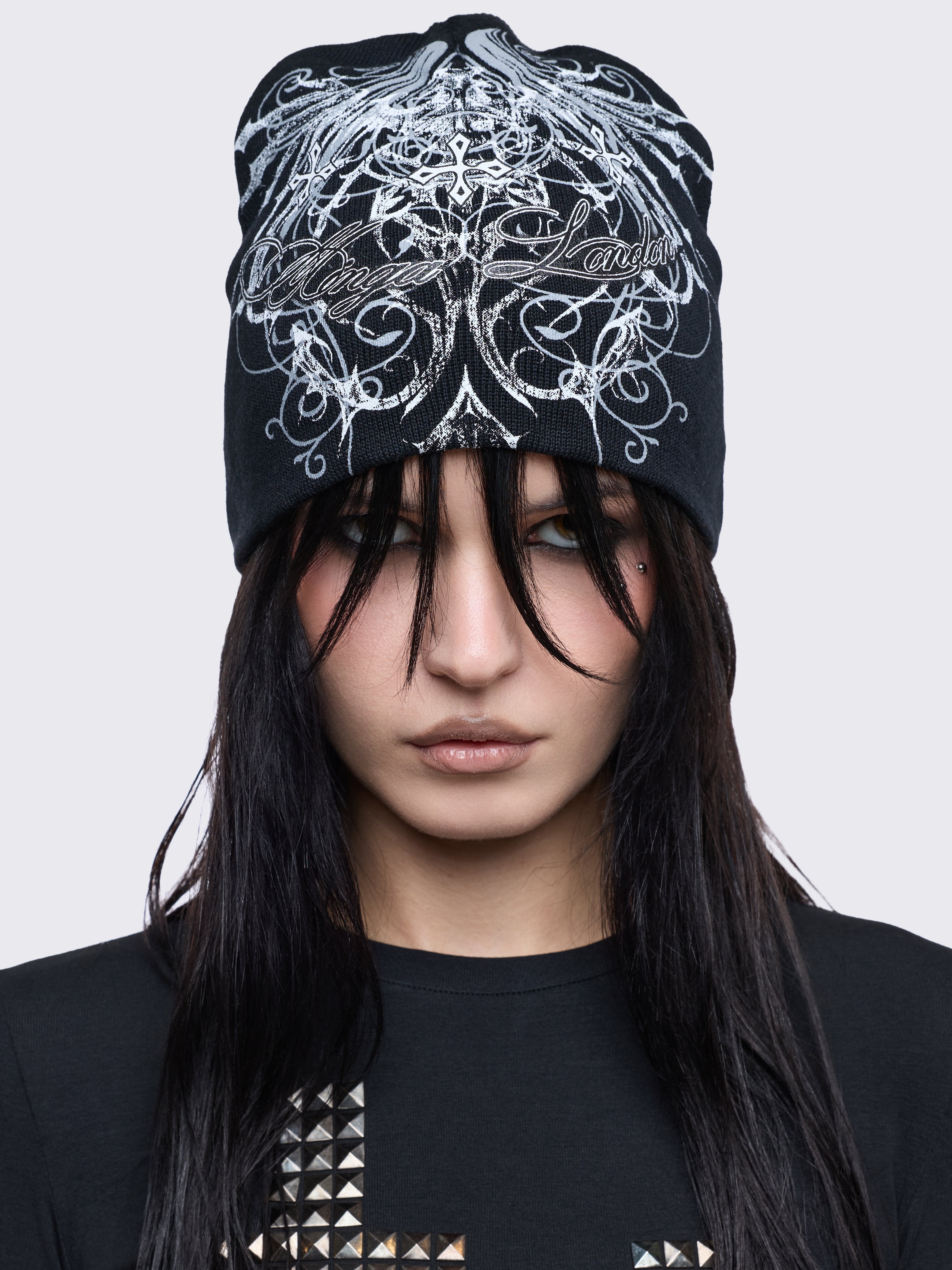 Black beanie hat with grunge graphic print