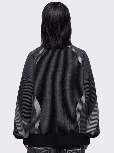 Black and grey color block knitted zip-up cardigan.