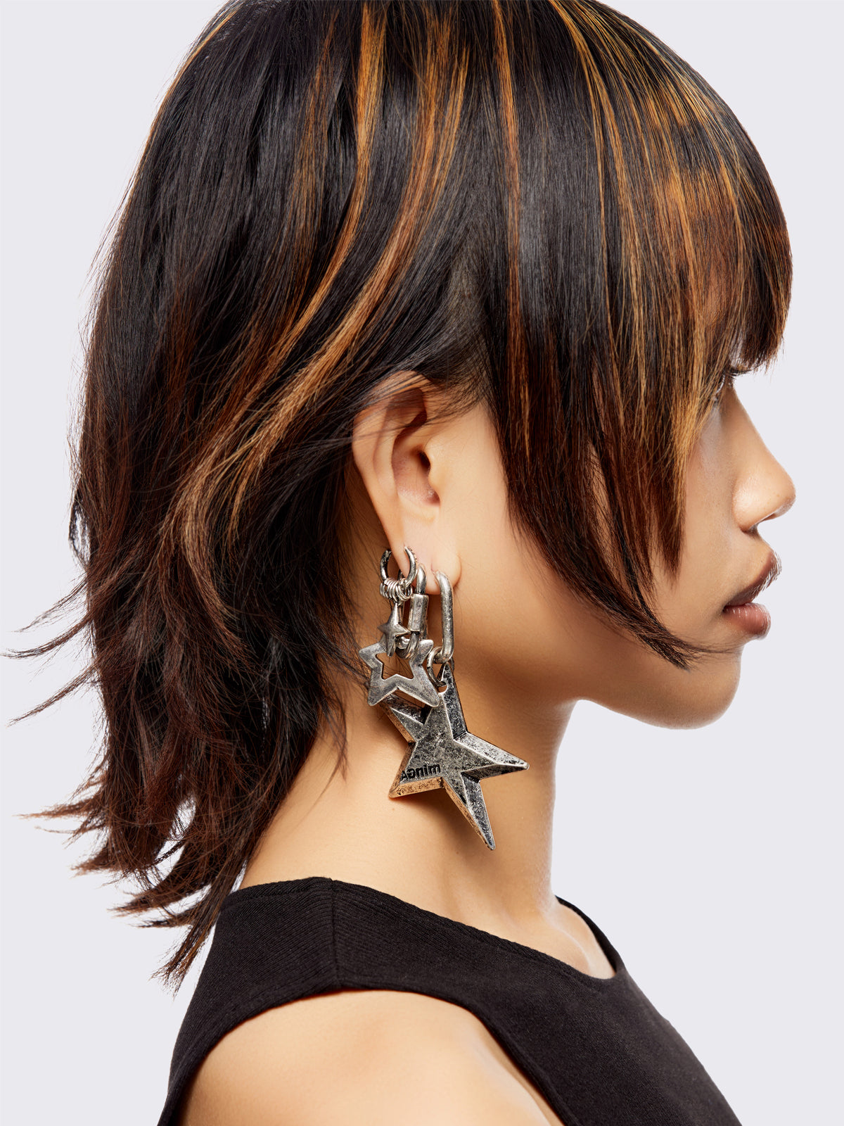 Silver 4pc chunky earring set featuring a mixed textures and bold shapes with star pendants.